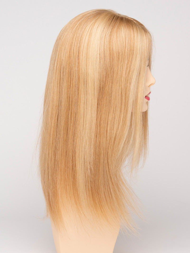 profile side of a long Kinner Beauty Wigs wig for woman on mannequin head 