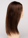 profile side of a long Kinner Beauty Wigs wig for woman on mannequin head 