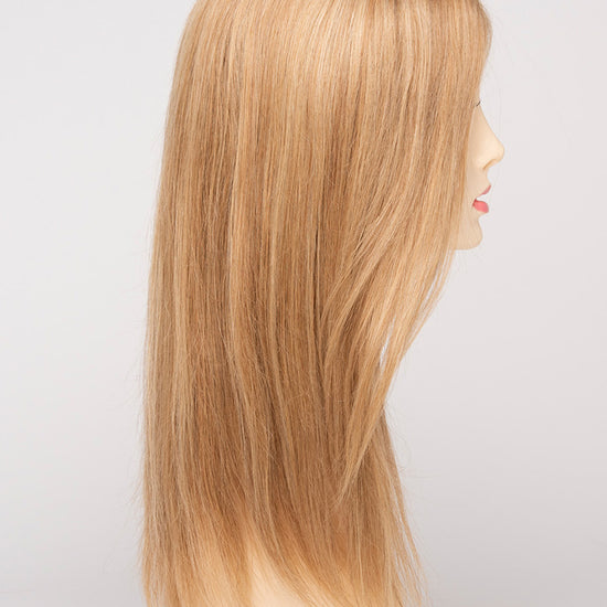 profile side of a long Kinner Beauty Wigs wig for woman on mannequin head 